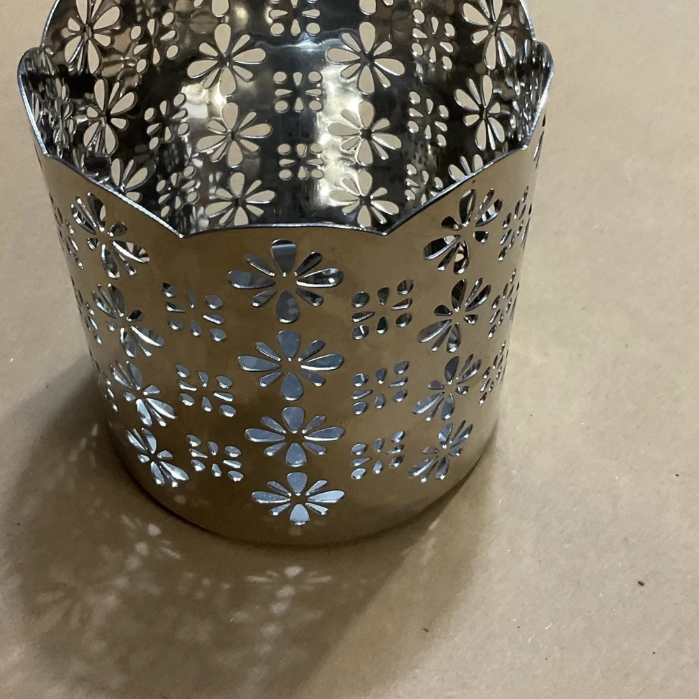 Elegant Silver Floral Cutout Candle Holder
